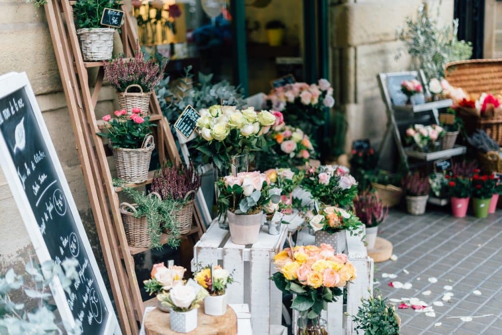 Clarise's Florist to whom she issued the check that got her an NSF fee
